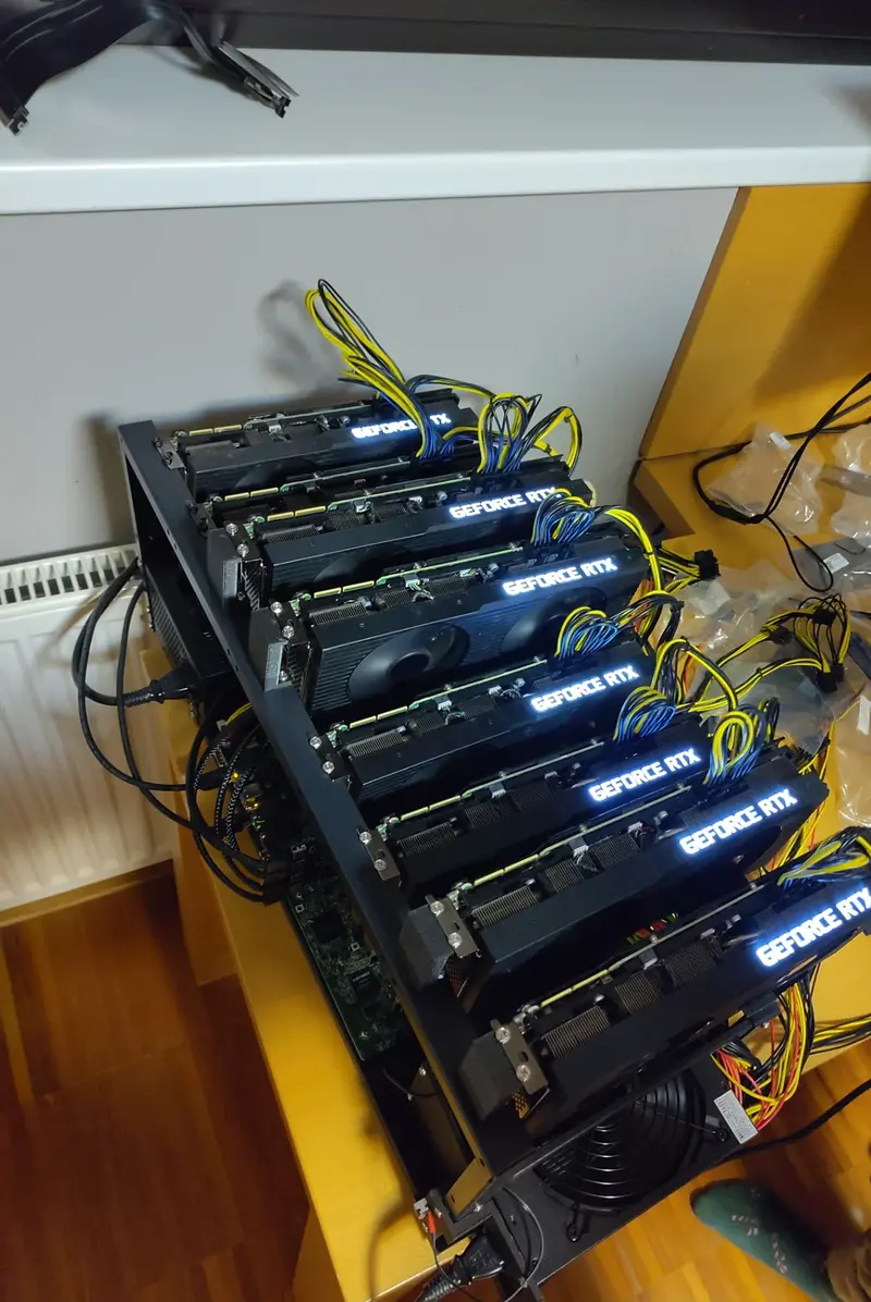 Photo of 8x RTX 3090 rig, all connected to 1 motherboard