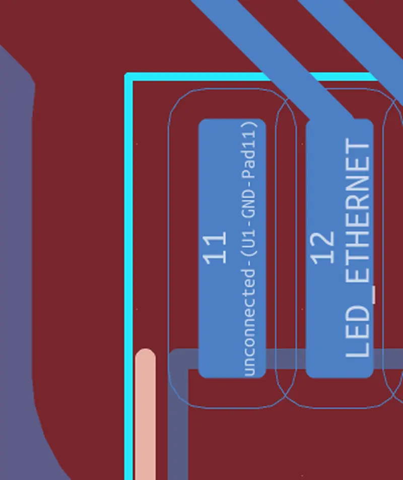 KiCad PCB design view highlighting an unconnected pad labeled '11 unconnected'